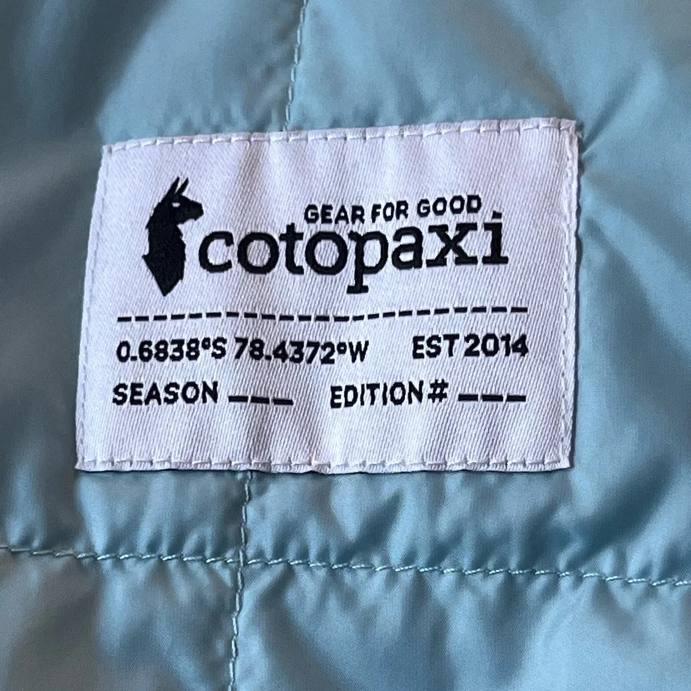 Cotopaxi Multi-blues Reversible Hooded Puffer Vest - Picture 5 of 11